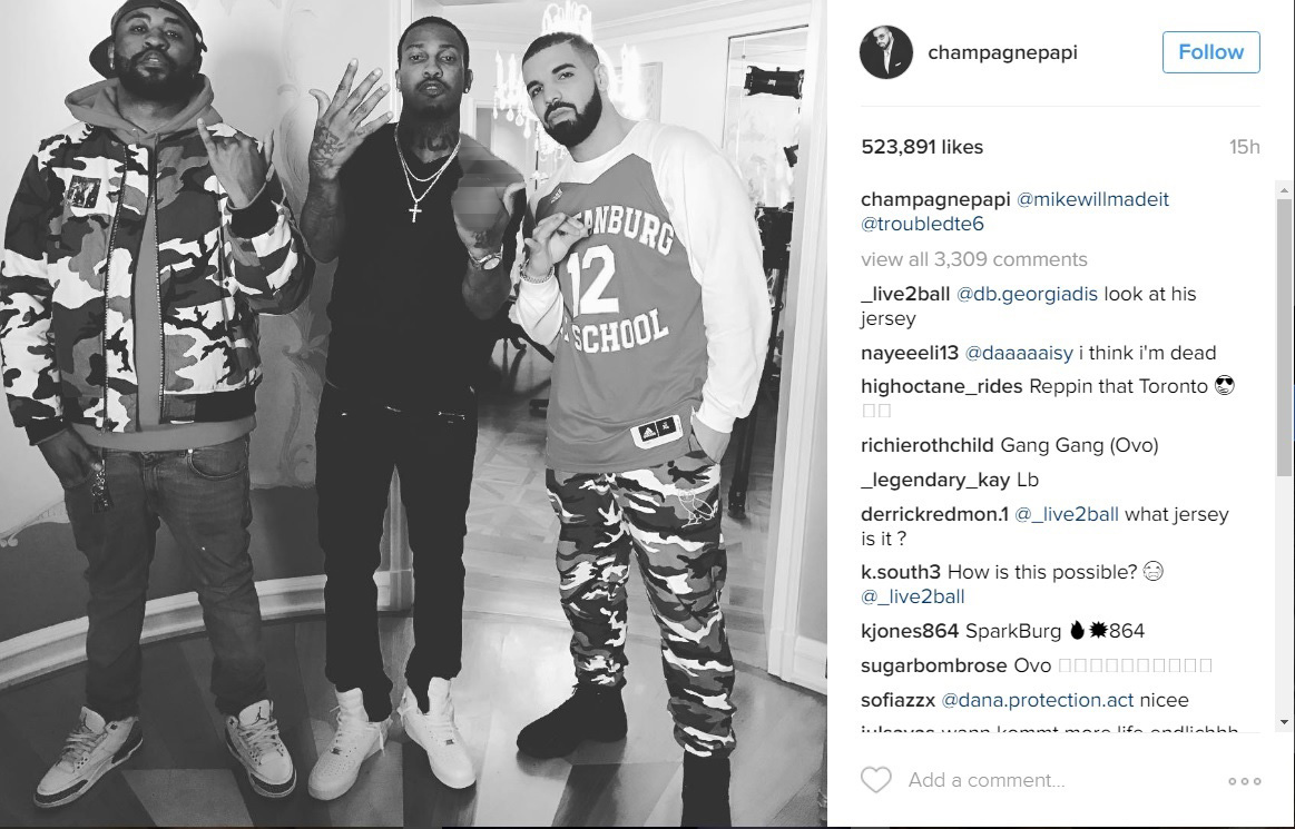 Drake wearing zion store jersey